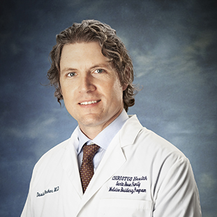 A headshot of David Parker