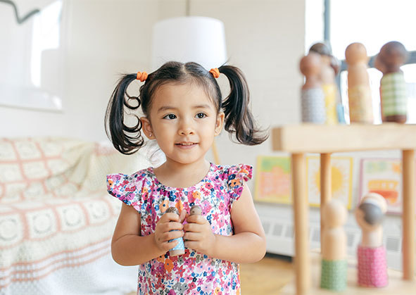 A smiling little Hispanic girl